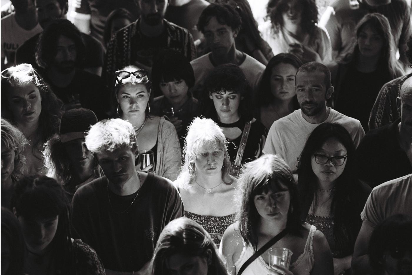 Black and white image of large crowd